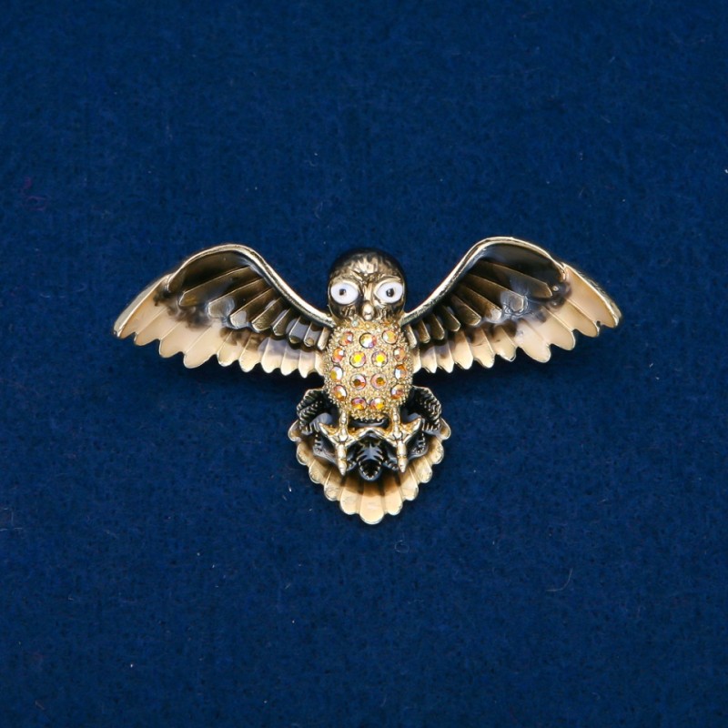 Brooch Bird with enamel and petrol-colored rhinestones, gold-toned metal 65x35mm +