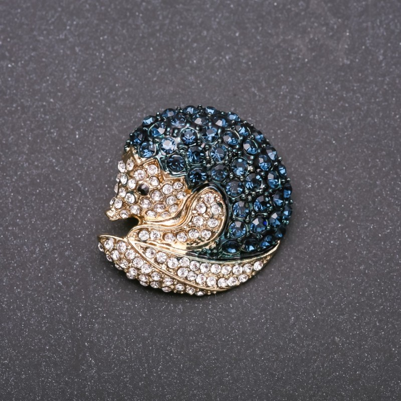Brooch 'Nosukha' in blue and white crystals on yellow metal 33×35 mm