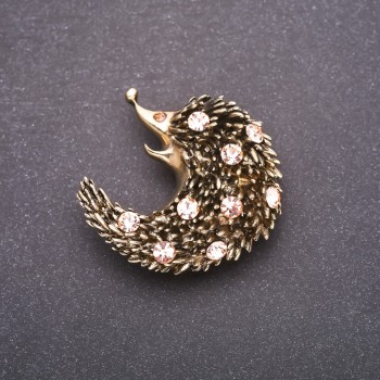Brooch with pink rhinestones 42x42mm in yellow metal