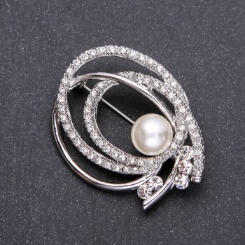 Pearl brooch in white-silver metal color 57 x 30 mm