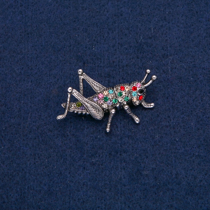 Brooch 'Grasshopper' silver-colored metal with multicolored crystals 42x26mm +