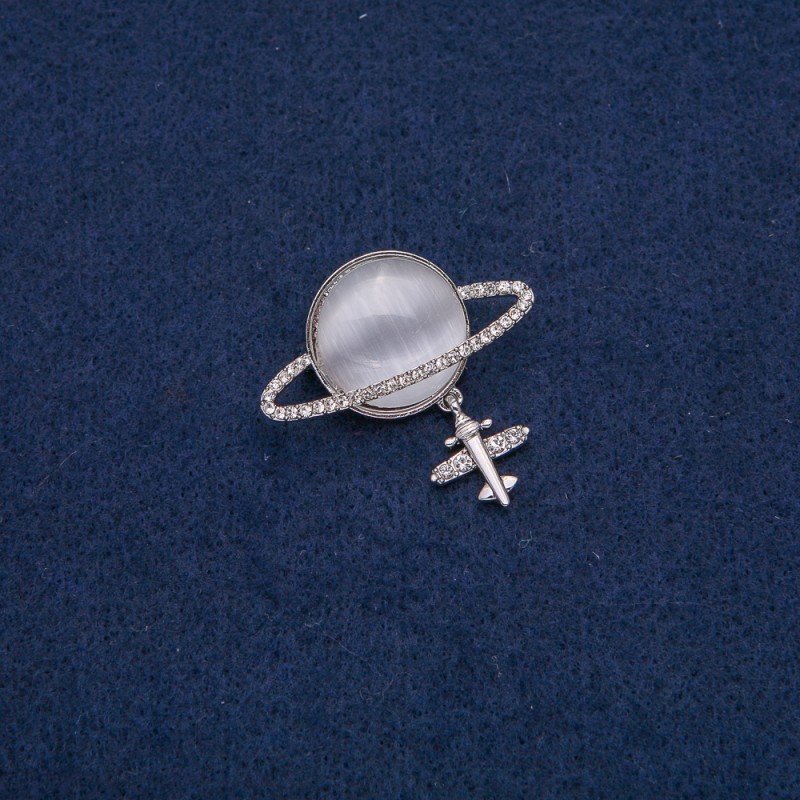 Brooch Saturn Cat's Eye (silver) with plane motif, silver metal with white crystals 35x20mm