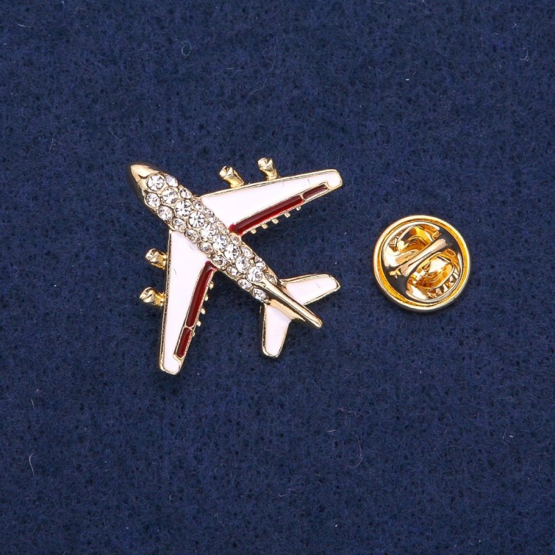 Brooch 'Plane' 27x30mm brown stripe, metal color 'gold'