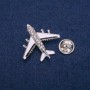 Brooch Airplane with white and black enamel, crystals, silver-toned metal 29x30mm