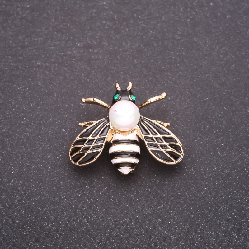 Butterfly Brooch with White and Black Enamel on Yellow Metal