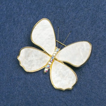 Brooch Butterfly, golden metal, white mother-of-pearl, and petrol rhinestones 38x45mm +