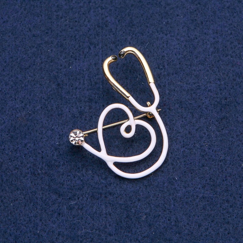 Brooch White Stethoscope with Heart, White Stone, Golden Metal 43x33mm