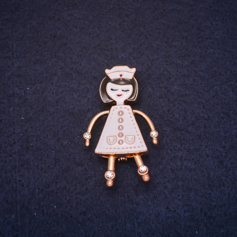 Brooch 'Nurse' enamel white, 42 x 26 mm, golden metal