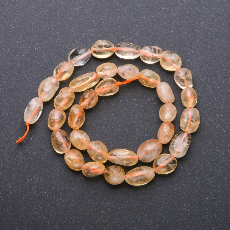 Citrine beads on thread 'tumbled', diameter 8x12 mm, length 38 cm