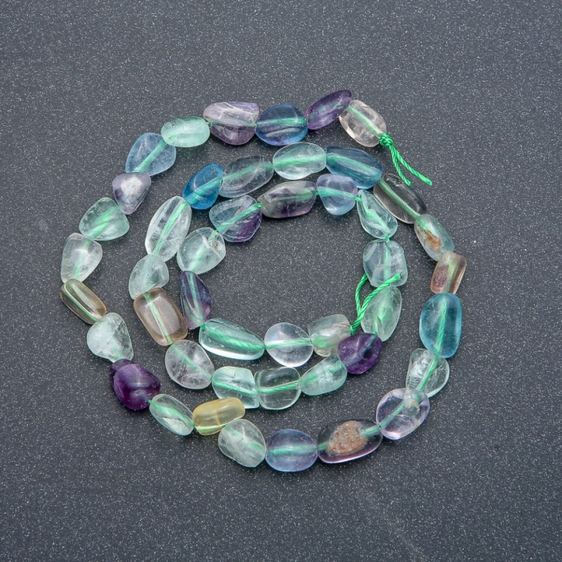 Beads on a thread of natural fluorite, faceted, 7x9 mm, length 39 cm +