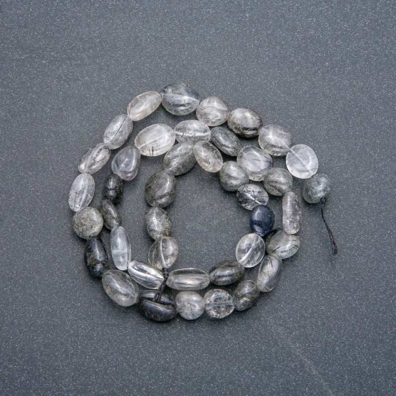 Beads on a thread of natural stone Hairy rutile quartz faceted, 8x9 mm, length 41 cm +