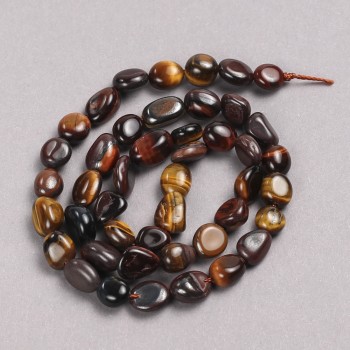 Beads on thread of natural Bull's Eye, Hawk's Eye, and Tiger's Eye – soft-faceted, 6x8 mm, length 39 cm +