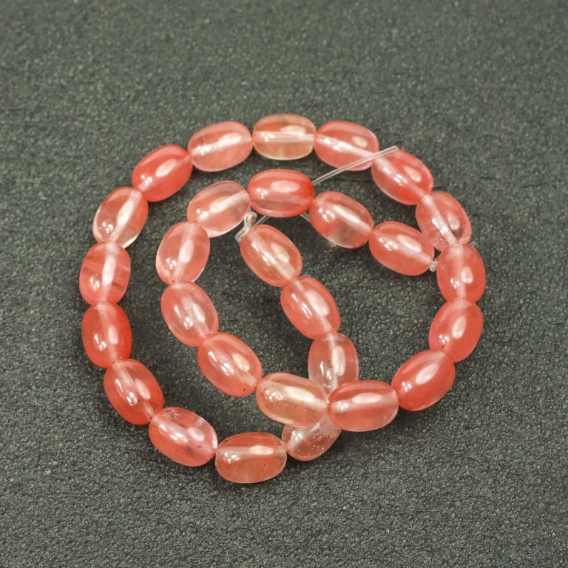 Beads on a strand of natural chalcedony in barrel shape, diameter 10×14 mm, length 39 cm