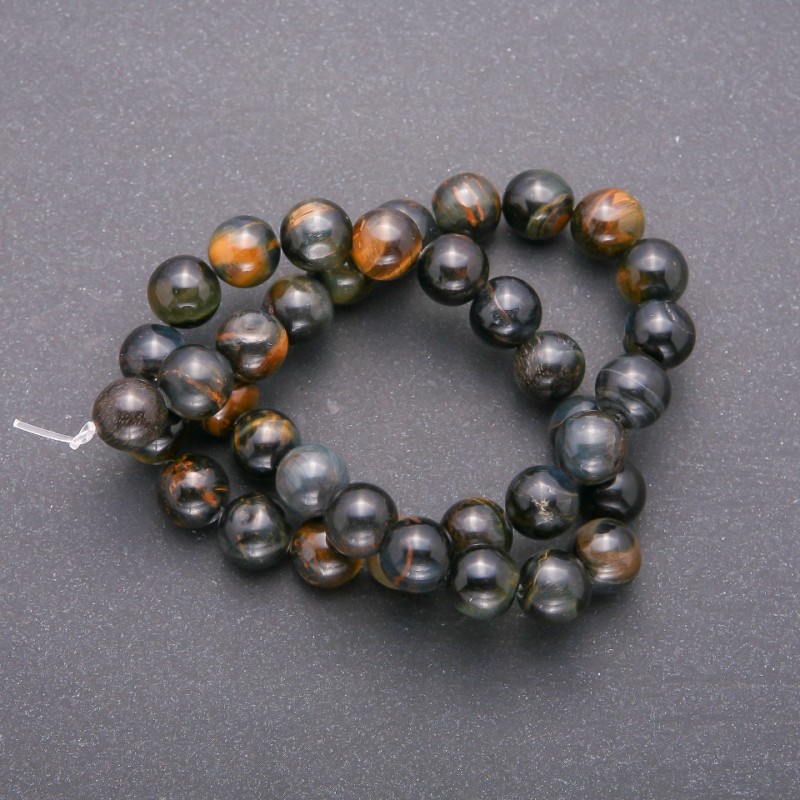 Beads of natural Tiger's Eye stone - smooth spheres, diameter 10 mm (+/-), on a thread, length 38 cm (+/-)