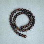 Beads made from natural Bull's Eye stone, smooth round beads, 8 mm diameter (±), thread length 38 cm (±)