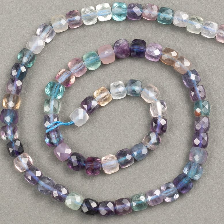 Beads on a cord of natural stone, fluorite faceted cube 6x6 mm, length 40 cm +