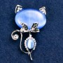 Brooch 'Kitty Cat's Eye' blue with white crystals 45x28mm silver metal