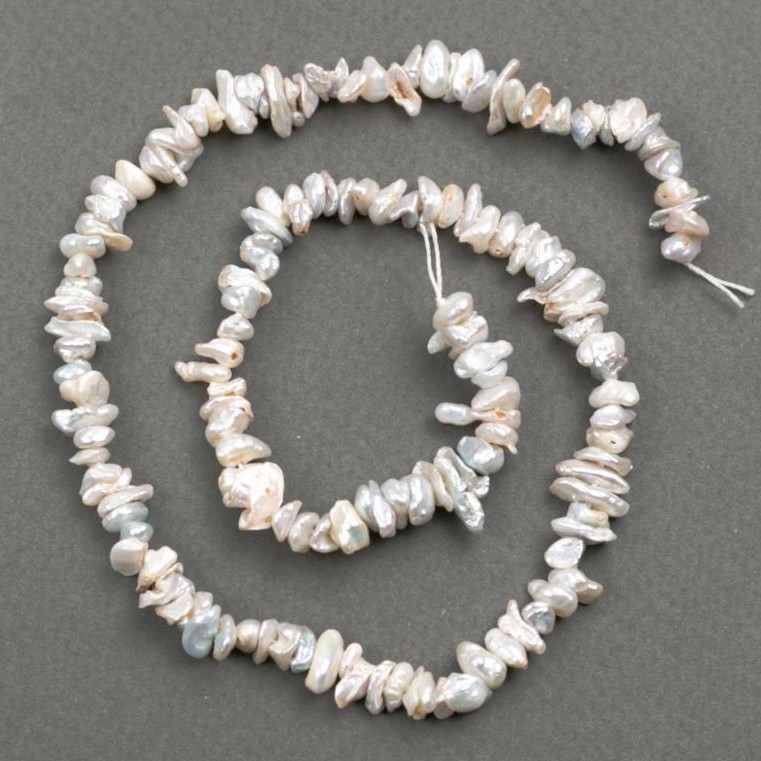 Baroque Pearl Grain Thread with a 'Gasoline' Shade, diameter 6x1-3 mm, length 39 cm+