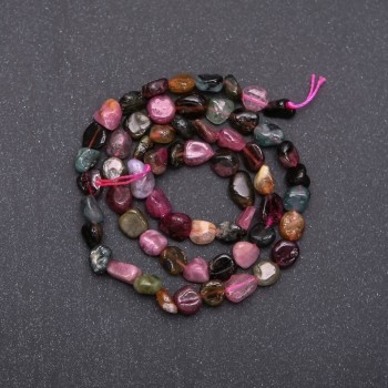 Faceted tourmaline beads, 7 mm diameter (+/-), on a strand, 38 cm long
