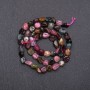 Faceted tourmaline beads, 7 mm diameter (+/-), on a strand, 38 cm long