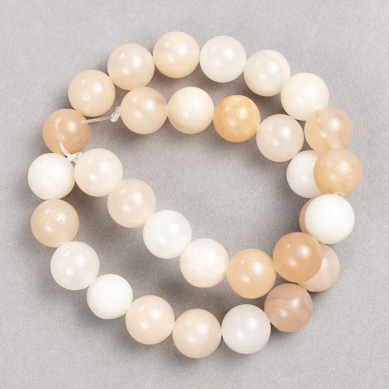 Selenite Beads (imitation acrylic) on a beading thread, smooth spheres, diameter 12 mm ±, length 38 cm ±