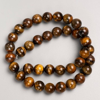 Beads on natural Tiger's Eye thread, diameter 10mm +-, length 38cm +-