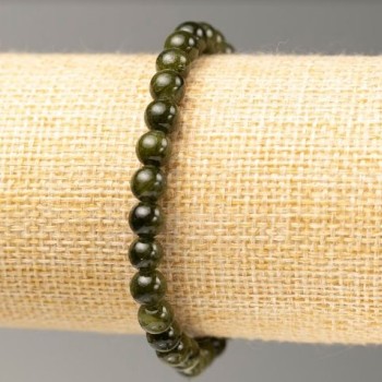 Discount! Elastic bracelet with dark green tinted quartz (imitation acrylic), diameter 6.5 mm ±, length 18 cm ±