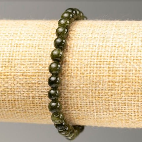Discount! Elastic bracelet with dark green tinted quartz (imitation acrylic), diameter 6.5 mm ±, length 18 cm ±