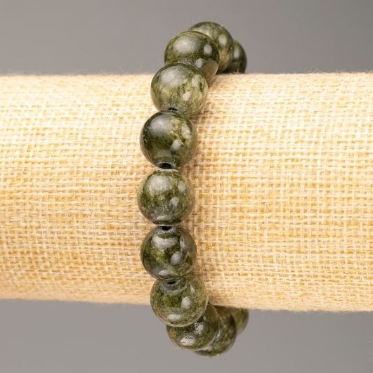 Sale! Elastic bracelet on an elastic cord tinted quartz (imitation acrylic) dark green smooth bead, diameter 12.5 mm, length 18 cm