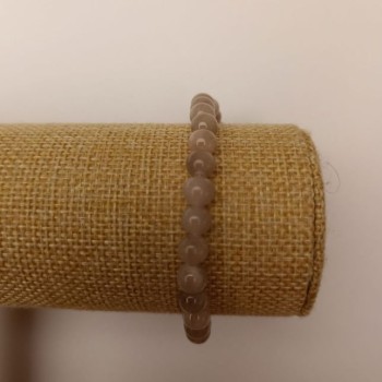 Sale! Elastic bracelet with tinted quartz (imitation acrylic) gray smooth beads, diameter 6.5 mm, length 18 cm