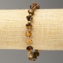 Elastic bracelet with tiger's eye stone, faceted bicones, 8x8 mm diameter, length 18 cm +/-