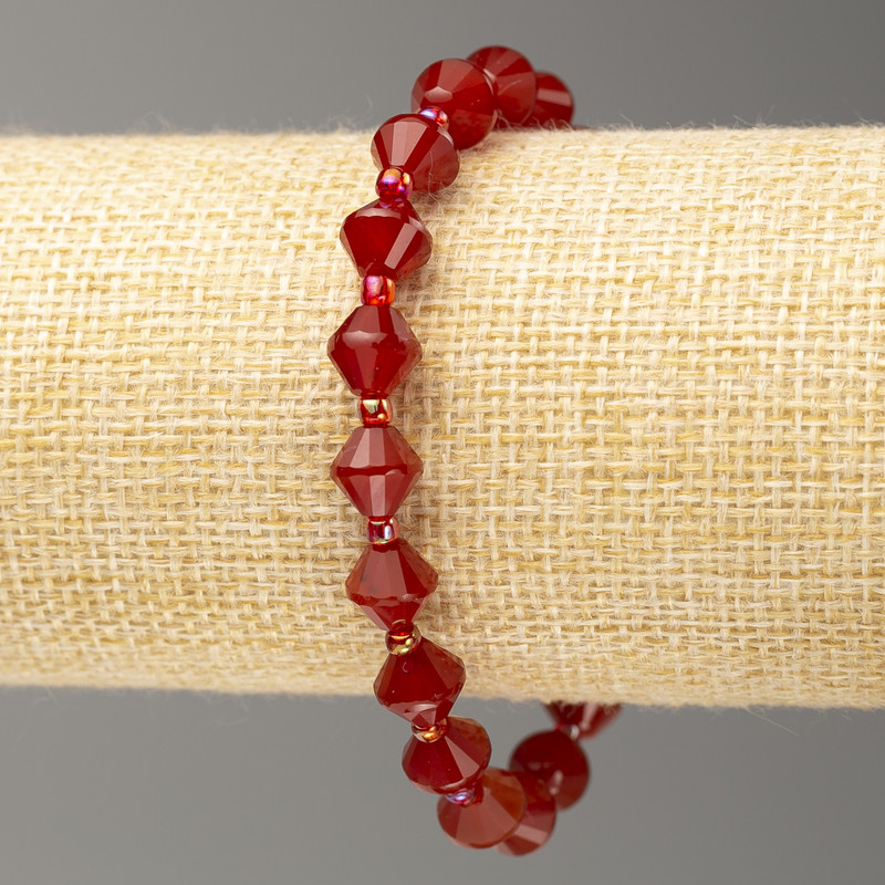 Elastic bracelet with carnelian stone, faceted bicones, 8x8 mm diameter, length 18 cm +/-