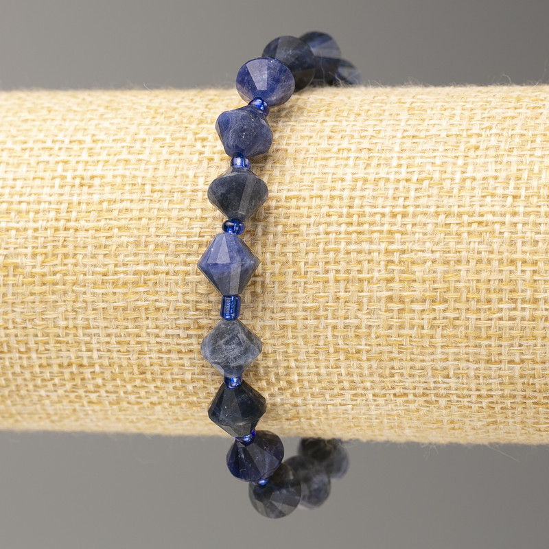 Elastic bracelet with sodalite stone, faceted bicone, 8x8 mm, length 18 cm ±