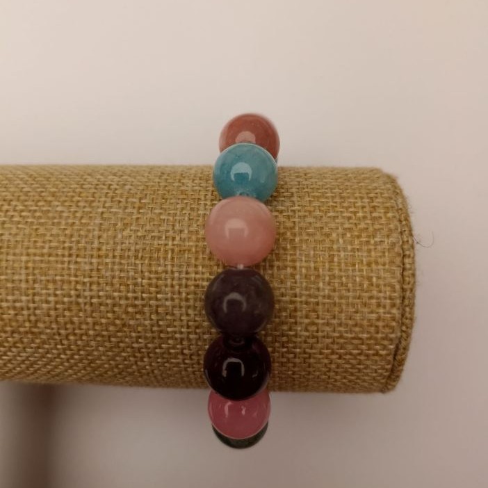 Elastic bracelet with toned quartz "Assorted" (imitation acrylic) smooth beads, diameter 12.5 mm, length 18 cm +/-