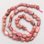 Rhodochrosite Beads on Cord, Tumbled, 7x9–6x7 mm, 40 cm length