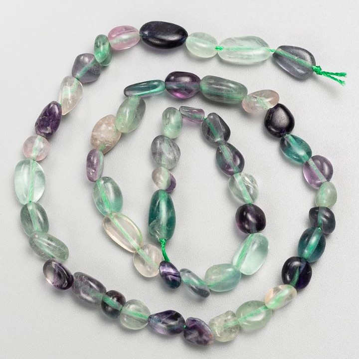 Natural fluorite beads on a thread, tumbled, size 7x11-6x8 mm, length 40 cm