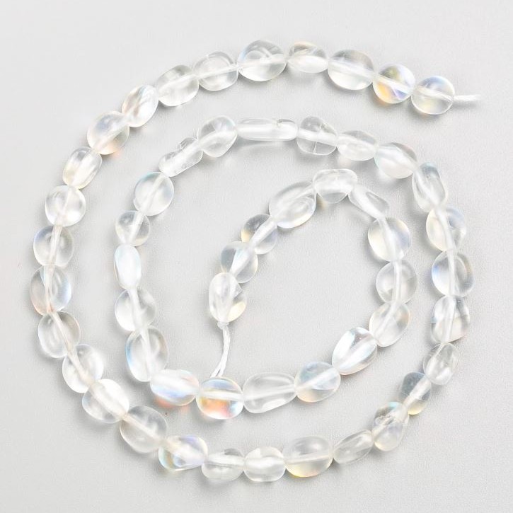 Beads on a thread of opal glass, tumbled, 6×7 mm, length 40 cm