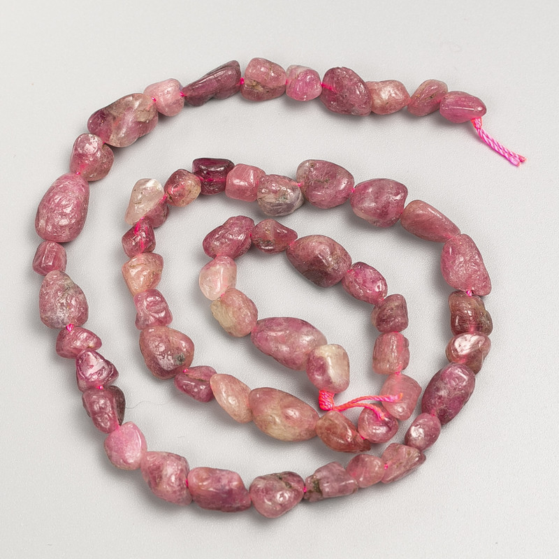 Beads of Rubellite Tourmaline – natural, faceted on thread, diameter 7×9 mm ±, length 39 cm ±