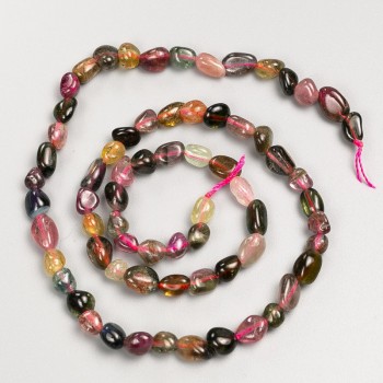 Beads of natural tourmaline stone, faceted, on a thread, diameter 5x7 mm, length 40 cm