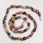 Beads of natural tourmaline stone, faceted, on a thread, diameter 5x7 mm, length 40 cm