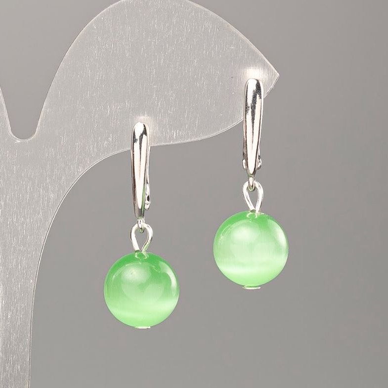 Earrings with natural green Cat's Eye stone, diameter 10 mm ±, length 31 mm ±