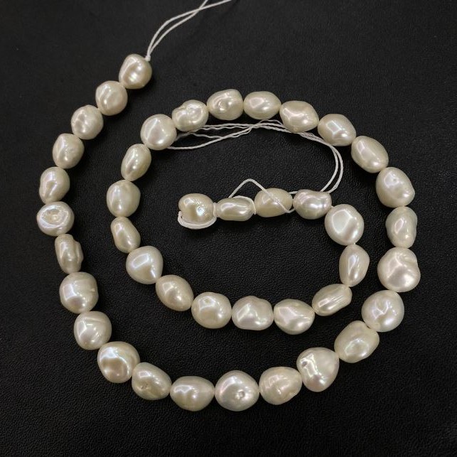 Freshwater Pearl Strand, diameter 9×8 mm, length 40 cm ± with gasoline iridescence