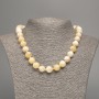 Sale! Yellow-white 'Selenite' smooth-bead necklace, diameter 12 mm ±, length 50 cm ±, with white nephrite stone (synthetic dye)