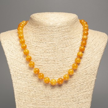 Discount! Orange-yellow necklace 'Amber' with smooth beads, diameter 10mm±, length 50cm±, made of white jade (synthetic dyed)