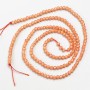 Small synthetic spinel beads, coral color, faceted round beads, 2 mm diameter, on a 37 cm strand