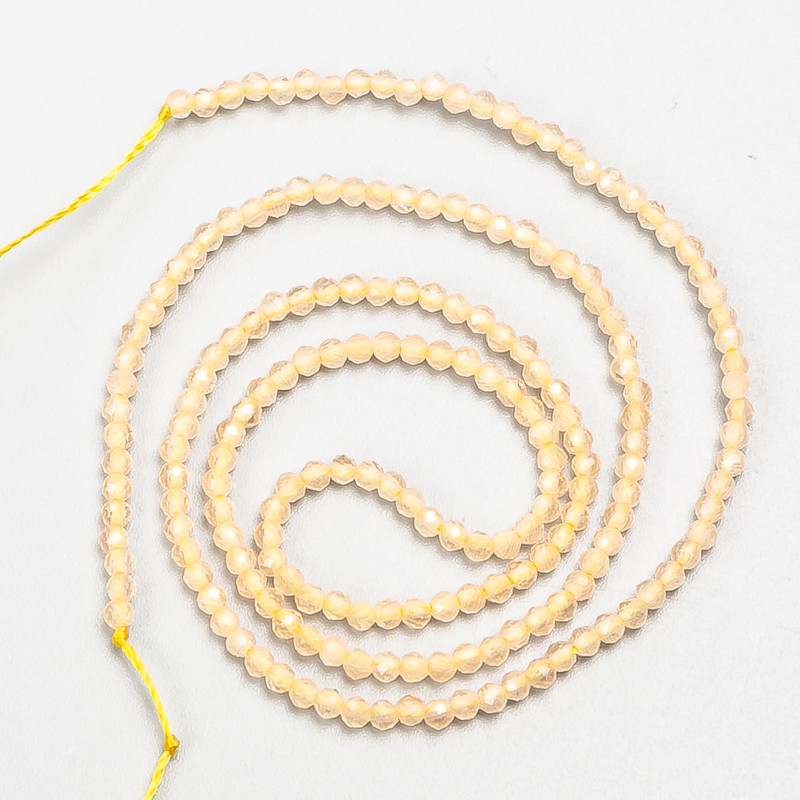 Small synthetic spinel beads, beige champagne, faceted beads, 2 mm diameter ±, on thread, length 37 cm