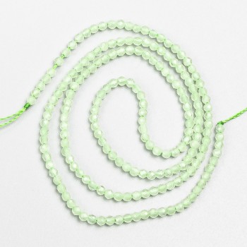 Small spinel beads (synthetic) pale-green faceted spheres, 2 mm diameter, on a thread, length 37 cm