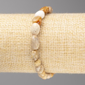 Bracelet with fossilized coral faceted beads, diameter 7x10 mm ± on elastic, length 18 cm+