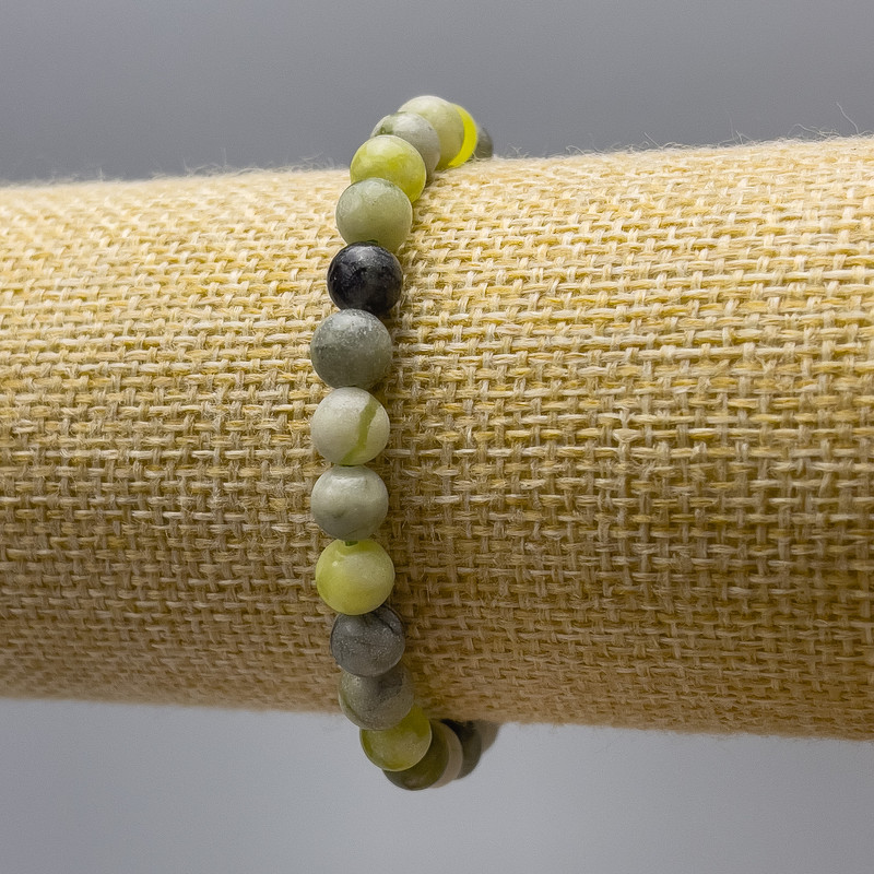 Ophite Bracelet (imitation acrylic) smooth beads, diameter 6.5 mm ±, length 18 cm (stretch)