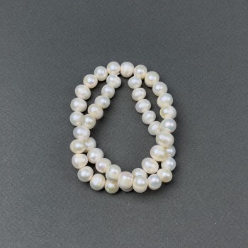 Freshwater oval pearls on a thread, diameter 10×8 mm, length 38 cm